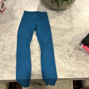 Older luluemon leggings. Size 2 wonder under leggings.